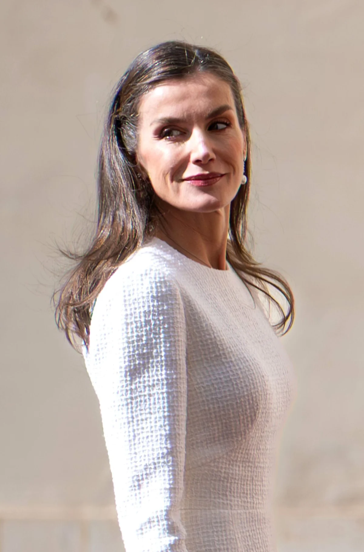 Queen Letizia of Spain Redefines Spring Royal Protocol with Nude Buckled Heels and Textured White Midi Dress During Official Vatican Visit